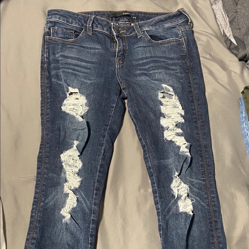 Dark wash distressed skinny jeans